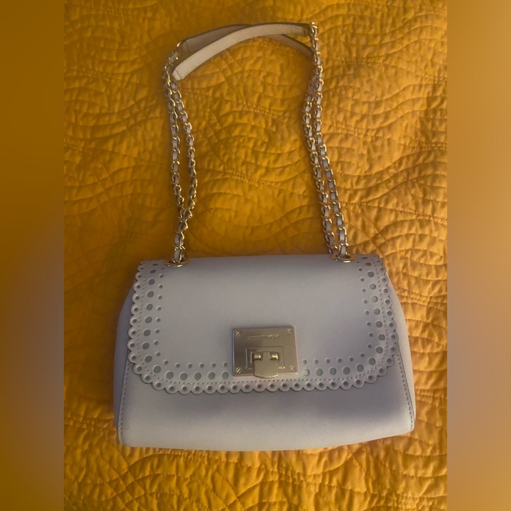 Michael Kors Crossbody yet adjustable for shoulder bag 12” x 9” pink leather